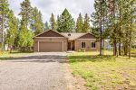 Harlequin Cabin Easy in and out driveway with plenty of room for your vehicles. Fenced back yard on 1/2 acre lot.